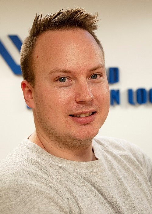 Andreas Malmström, projektledare Ystad hamn. Foto: Agne Hörnestig. Andreas Malmström, projektledare Ystad hamn, ser in i kameran och ler.
