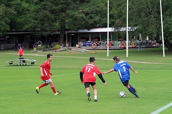 The crew from a cruise ship playing football on Kaknäs Seafarer's Center