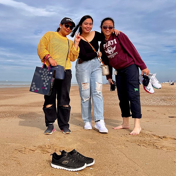 Three women on a beach in Zeebrugge