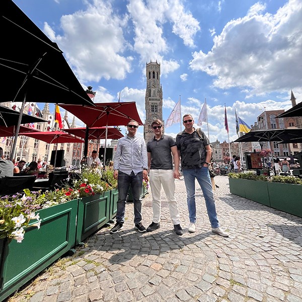 Three seafarers on a sightseeing in Bruges