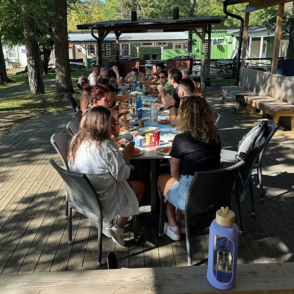 A cruise ship crew having a BBQ on the Kaknäs porch